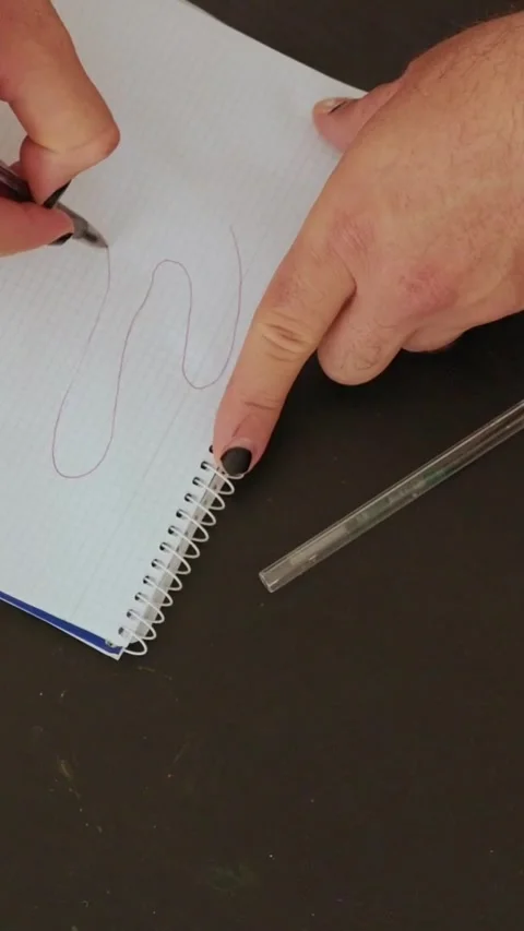 Man drawing hand contour on notepad Stock Footage 327862423
