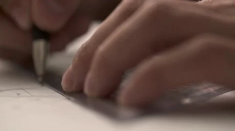 Man drawing lines in a technical blueprint Stock Footage 67444405