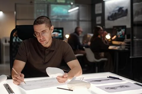 Man drawing new automobile prototype Stock Photos