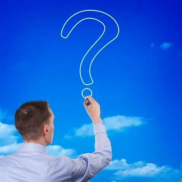 Man drawing a question mark Stock Photos