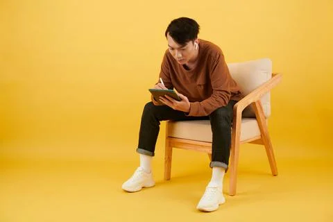 Man Drawing on Tablet Computer Stock Photos