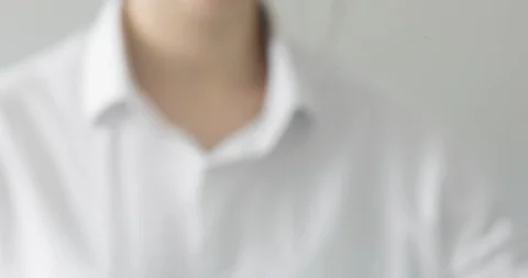 Man draws infinity sign on transparent screen using green marker, hand closeup. Stock Footage 129898996