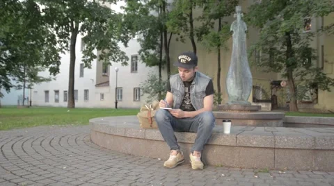 A man draws in a notebook. Stock Footage 51755731