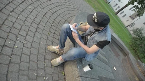 A man draws in a notebook. Stock Footage 51755844