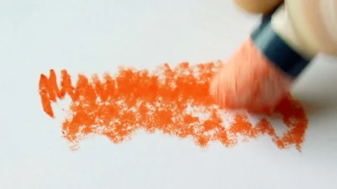 Man draws pastel on paper Stock Footage 78913480