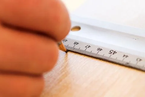 Man draws a pencil Stock Photos