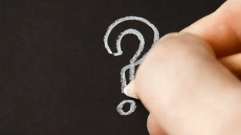 Man draws a question mark Stock Footage 78910985