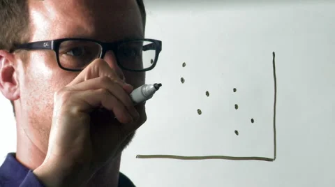 Man Draws a Scatter Graph on a Pane of Glass Stock Footage 61480243