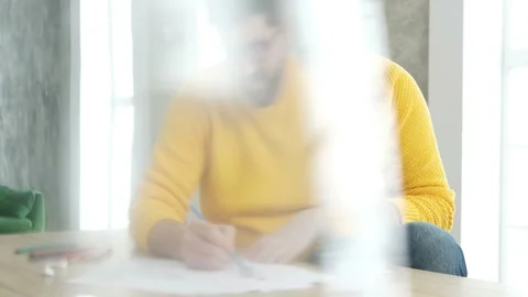 Man draws a sketch in the office. Video stock 85669985