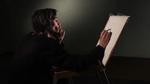 Man draws in studio. Stock Footage 56725381
