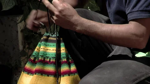 A Man with Drawstring Bag Backpack in Andean Textile. Close Up. Video stock 220585640