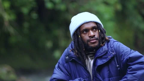 A Man With Dreadlocks Suffering From Coldness Stock Footage 208044769