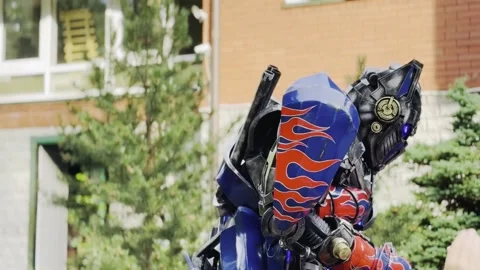 A man dressed in a blue and red costume with a black mask and a blue helmet Video stock 280732452