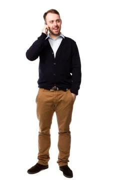 Man dressed casually talking on mobile phone Stock Photos