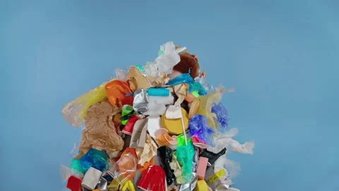 Man dressed in garbage costume doing gun shot gesture. Slowmotion. Video stock 147178387