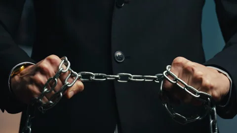 Man dressed in jacket with chain on hands Stock Footage 172348990