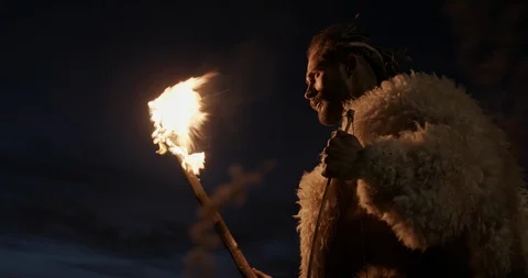 Man dressed in sheepskins walking at night, Man dressed in sheepskins walking at Vídeos de archivo 129751237
