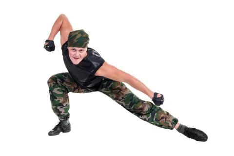 Man dressed soldier posing in front fighter isolated on white 库存照片