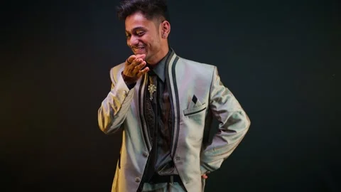 Man dressed in suit chuckling during the conversation Stock Footage 301442758