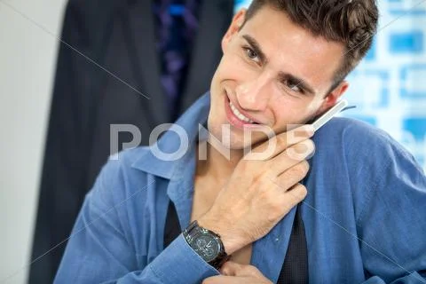Man dresses up and talking on phone Stock Photos