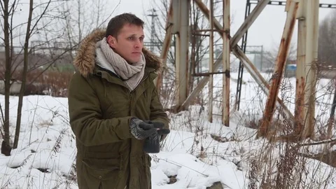 Man dresses gloves Stock Footage 82318477