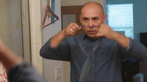 Man dressing up in the bathroom 스톡 동영상 83188840