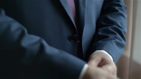 Man dressing dark blue suit Stock Footage 60121031