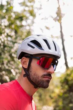 Man dressing next to his van to go cycling Stock Photos