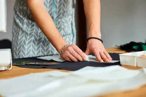 Man dressmaker making sewing patterns, male tailor working with sewing patter Stock Photos