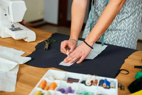 Man dressmaker making sewing patterns, male tailor working with sewing patter Stock Photos