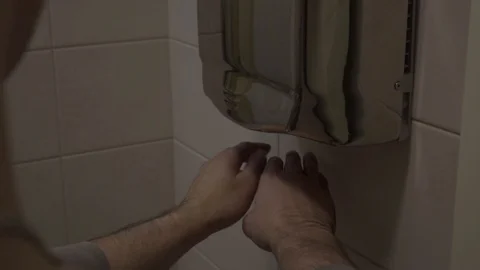 Man dries his hands Stock Footage 97652251