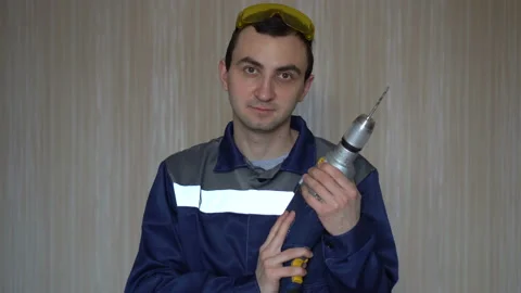 Man with a drill. part №1 Stock-Footage 103112613
