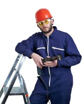 Man with drill Stock-Fotos