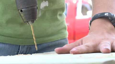 Man drilling board Stock Footage 57674245