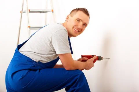 Man drilling hole 스톡 사진