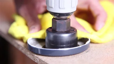 Man drilling plastic with drill Stock Footage 56629521