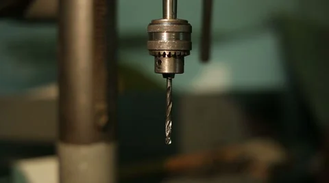Man drills a detail on a drilling machine Stock Footage 59595915
