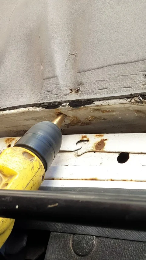 A man drills a drill . vertical video with sound Stock Footage 114758534