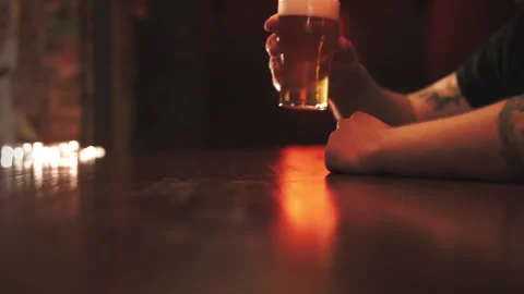 Man drink beer in a bar Stock Footage 239790292