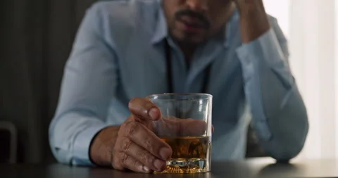 Man drinking alcohol to relieve depressed and stressed with problems in his life Stock Footage 246478201