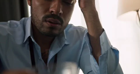 Man drinking alcohol to relieve depressed and stressed with problems in his life Stock Footage 246624767