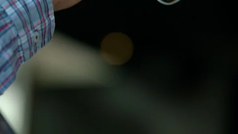Man drinking and putting down glass of white wine Stock Footage 86927850
