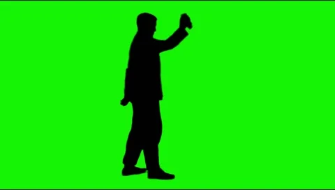 Man drinking and saluting silhouette on green screen Stock Footage 49971699