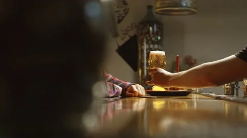 A man drinking beer in a bar Stock Footage 153157674