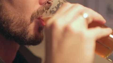 Man Drinking Beer In Slow Motion Close Up Vídeo Stock 344557340