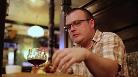 Man Drinking Beer With Toasts And Talking Stock Footage 45859791
