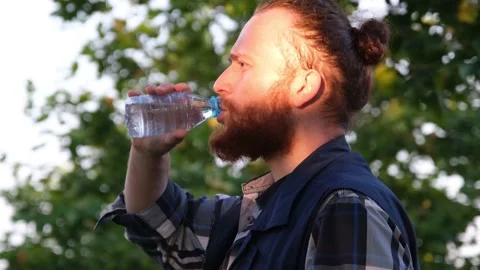 Man drinking, caucasian man drinking water Stock Footage 162914774