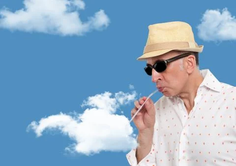 Man drinking from a cloud Stock Photos