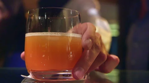 Man drinking a cocktail in a bar Stock Footage 47139700
