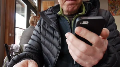 Man drinking coffee and texting Stock Footage 48750595